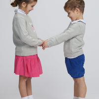 Little English traditional children's clothing. Gray intarsia sweater with frenchie dog motif for little girl, Gray intarsia sweater with frenchie dog motif for little boy, Jillian skirt in hot pink corduroy, banded short in royal blue corduroy, long sleeve hastings polo in white, piped peter pan shirt in white, for fall