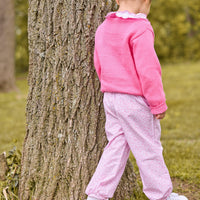 little english classic children's clothing hot pink sweater with white bow motif, Double london blouse with hot pink trim on collar, banded bow pant in pink vinings pattern, fall outfit for girls