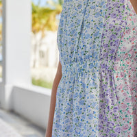 Little English classic knee high dress with a floral pattern in pink, purple, and blue