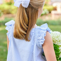 Little English traditional children's clothing. Light blue and white check seersucker dress for girls for Spring and Summer