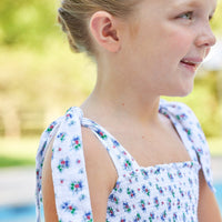 Little English traditional children's clothing. Blue and red floral print dress for girls for Summer. 4th of July outfit for little girls