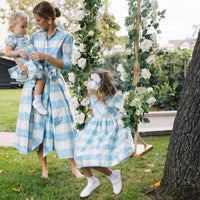 Little English X Luciana Emilia Capsule Collection special occasion dress for little girls. Formal dress in 100% silk blue check with peter pan collar and capped sleeves
