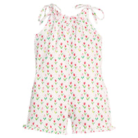 Little English traditional children's clothing. White romper with red and pink tulip print and self-tie straps for little girls