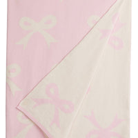 Little English giftable nursery accessory, reversible knit nursery blanket with light pink and cream bow print