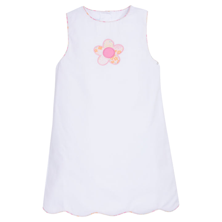 Little English traditional children's clothing.  Classic white shift dress with scallop hem and floral print flower applique .  Fun dress for young girls for Spring.