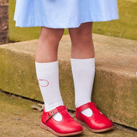 Little English classic white knee high socks with red apple embroidery. Paired with our peter pan apple pocket dress.