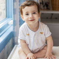 Little English classic children's clothing, white knit set with light blue picot trim and lab embroidery for baby boy. Classic gift set for baby