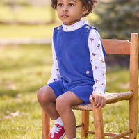 little english classic children's clothing white turtleneck with blue and red rocket print, button tab john john in royal blue corduroy, fall outfit for boy