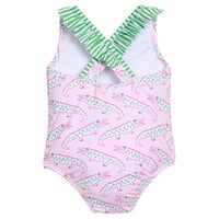 Little English traditional children's clothing. Pink swimsuit with green striped ruffled top and alligator pattern for little girls