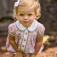Little English classic children's clothing. Pink and green floral set for baby girls. Puff sleeve top with white peter pan collar and placket with pumpkin embroidery paired with matching ruffled bloomer.
