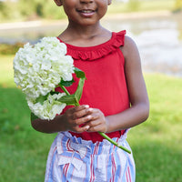 Little English traditional children's clothing. Red, white and blue striped seersucker shorts for girls for Summer. 4th of July shorts for girls