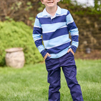 Little English classic children's clothing. Navy and light blue varsity stripe rugby polo paired with navy twill classic pants for boys.