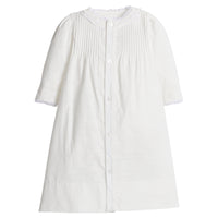 Little English traditional children's clothing. Unisex pleated ivory newborn gown with ruffles and embroidered detailing at the collar and sleeves