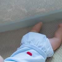 Little English traditional baby clothing, signature light blue crochet cardigan with red sailboat for baby boys