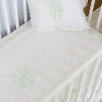 Little English traditional children's clothing. Scallop pillow case and embroidered crib sheet in meadow green embroidery