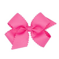 Little English traditional children's clothing. Girl's hot pink scallop edged hair bow for Spring