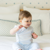 Little English traditional children's clothing. Set of 3 knit onesies in light blue stripe, light blue, and white with light blue stars. Baby jogger set in light blue. for baby boys.