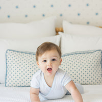 Little English traditional children's clothing. Set of 3 knit onesies in light blue stripe, light blue, and white with light blue stars. Baby jogger set in light blue for baby boys.