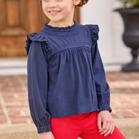 little english classic children's clothing girls navy long sleeve ruffle top with lace detailing a neck and chest, kick flare leggings in red, fall outfit for girl