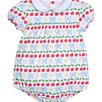 Little English traditional children's clothing. Short sleeve white knit peter pan bubble with back to school print for baby girls
