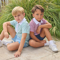 Little English classic short sleeve polo in blue, green, and white greenview stripe and red, white, and blue americana stripe. Sport short in light blue and navy. For little boy