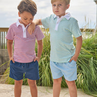 Little English classic short sleeve polo in blue, green, and white greenview stripe and red, white, and blue americana stripe. Sport short in light blue and navy. For little boy