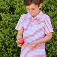 Little English classic children's clothing. Boys red and blue Primary Stripe short sleeve polo paired with red Sport Short. Back to school outfit for boys.