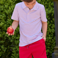 Little English classic children's clothing. Boys red and blue Primary Stripe short sleeve polo paired with red Sport Short. Back to school outfit for boys.