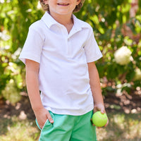Little English traditional children's clothing. Boy's green short with pockets for Spring. Boy's tennis short