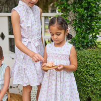 Little English traditional children's clothing. Classic sleeveless button down dress in pink and green floral for older girls