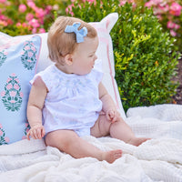 Little English traditional children's clothing. Smocked pima cotton knit bubble with bow and flower print for baby girls for Spring