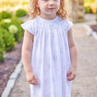 Little English traditional children's clothing. Smocked pima cotton knit dress with bow and flower print for little girls for Spring