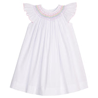 Little English traditional children's clothing. White flutter sleeve dress for toddler girls with rainbow smocking at the collar. Birthday dress for little girls