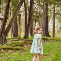 Little English traditional children's clothing, girl's classic light green plaid smocked dress for Spring with puff sleeves and peter pan collar