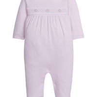 little english baby girl smocked footie with pink geo design and white peter pan collar