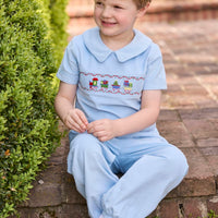 Little English traditional children's clothing. Boys blue corduroy set - banded pants paired with Eaton collar short sleeve top with holiday train smocking across the chest.