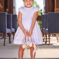 Little English traditional children's clothing. Dressy white dress with floral smocking for little girls for Spring. Special occasion outfit for toddler girl