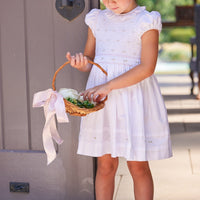 Little English traditional children's clothing. Dressy white dress with floral smocking for little girls for Spring. Special occasion outfit for toddler girl