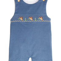 Little English traditional children's clothing for toddler boys, stormy blue corduroy john john with flying mallard smocking across chest.