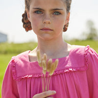 Little English classic childrens clothing tween girls bright pink long sleeve dress with ruffle detail on skirt and neckline