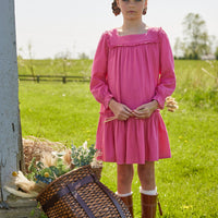 Little English classic childrens clothing tween girls bright pink long sleeve dress with ruffle detail on skirt and neckline