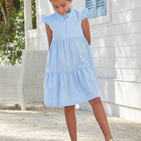 Little English traditional children’s clothing, girl's light blue tiered dress for Spring with ruffles at the collar and sleeves