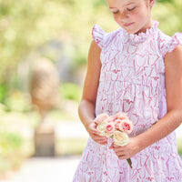 Little English traditional children's clothing. White and pink tulip print dress for girls for Spring. Easter outfit for girls