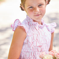 Little English traditional children's clothing. White and pink tulip print dress for girls for Spring. Easter outfit for girls