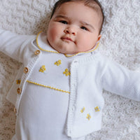 Little English traditional baby clothes, unisex signature white cotton playsuit with peter pan collar, yellow picot trim, and crochet bees for baby boys and girls
