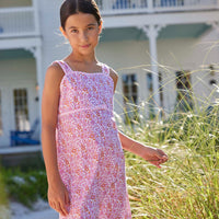classic childrens clothing girls strappy pink and orange floral dress with pink piping and skinny bow