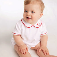 Little English piped peter pan bubble with red piping