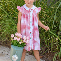 Little English traditional children's clothing. Classic dress for toddler girls in red windowpane with peter pan collar and tulip embroidery