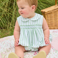 Little English traditional children's clothing.  Classic sleeveless smocked peter pan bubble with soft green and white stripes for baby boys