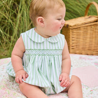 Little English traditional children's clothing.  Classic sleeveless smocked peter pan bubble with soft green and white stripes for baby boys